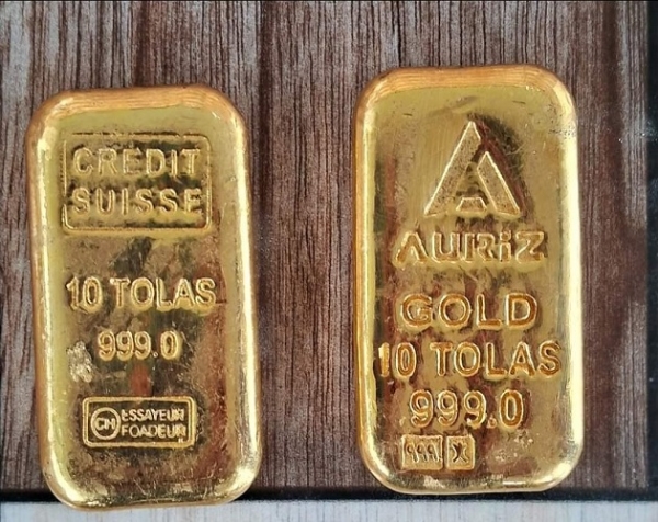 One arrested with gold biscuits One arrested with gold biscuits