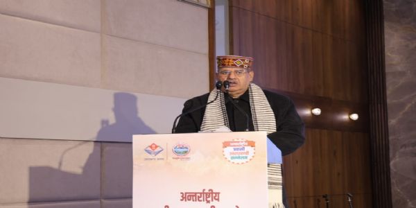 कृषि व ग्राम्य विकास मंत्री गणेश जोशी रविवार को अंतरराष्ट्रीय प्रवासी उत्तराखंड सम्मेलन के चतुर्थ सत्र को संबोधित करते हुए।