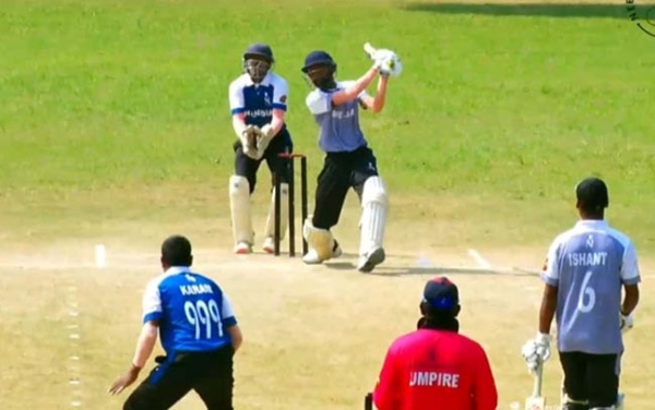 शॉट लगाता मेजा का बल्लेबाज शॉट लगाता मेजा का बल्लेबाज