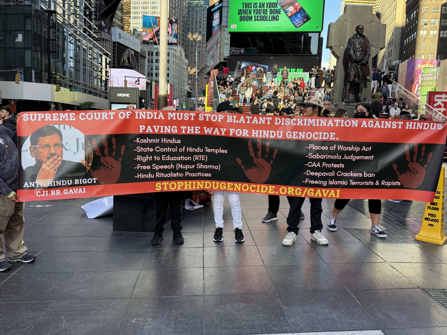 Hindu Organisations protested against CJI at Times Squire in New York Hindu Organisations protested against CJI at Times Squire in New York
