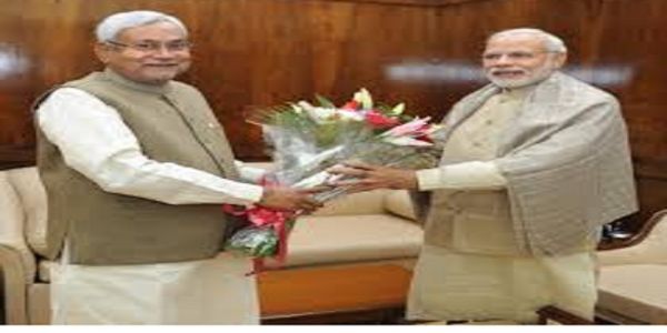पीएम मोदी और नीतीश कुमार की फोटो