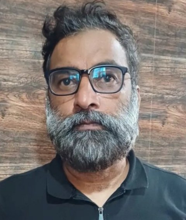 गिरफ्तारी के बाद  प्रमोद उपाध्याय