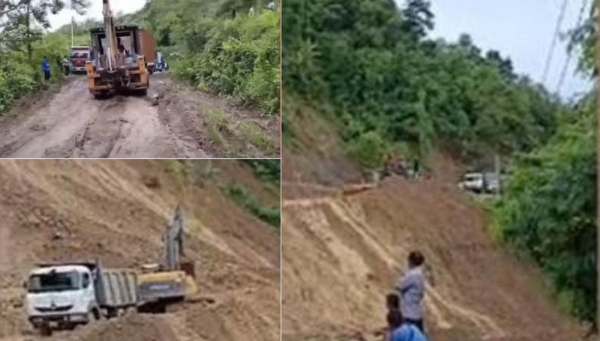 भारी भूस्खलन से असम-मणिपुर एनएच-37 मार्ग बाधित होने की तस्वीर।