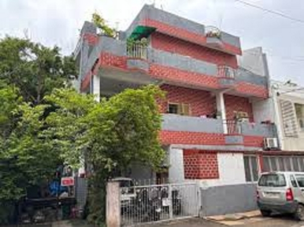 गाैतम नगर स्थित महिला का घर