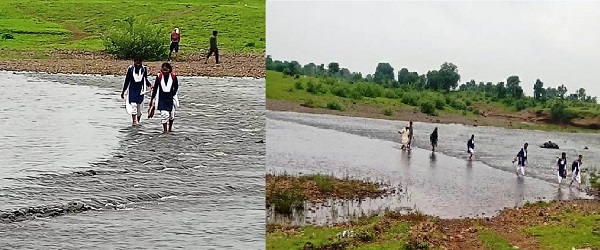 जान जोखिम में डालकर नदी पार करने को मजबूर