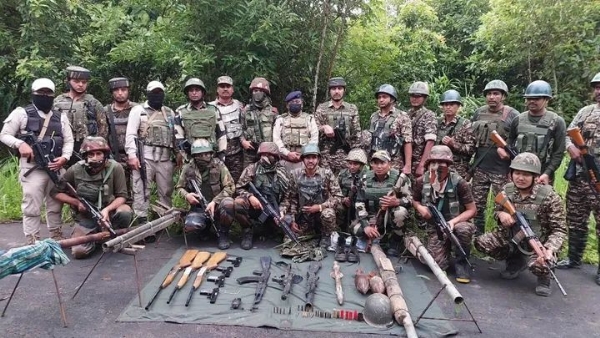 Image of the arms and explosives recovered and arrested rebel in Manipur.