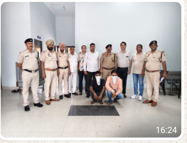 पकड़े गए अफीम तस्कर।