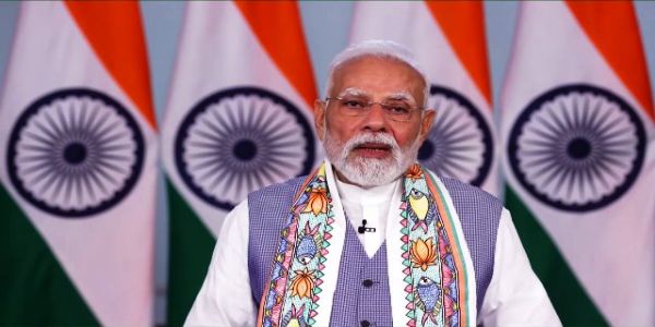 प्रधानमंत्री नरेन्द्र मोदी शुक्रवार को नई दिल्ली से बिहार के एक कार्यक्रम को संबोधित करते हुए