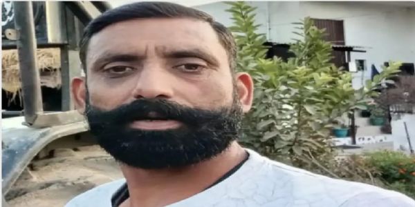 युवक का शव खेत में मिला