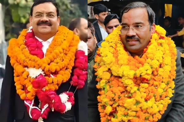 चुनाव जीत के बाद खुशी जाहिर करते नवनिर्वाचित अध्यक्ष मनोज हरित (बाएं) और सचिव दीपक पांडेय (दाएं)।