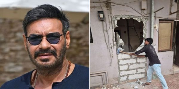 फोटो: फिल्म अभिनेता अजय देवगन के बंगले पर अवैध निर्माण को तोड़ते हुए मुंबई नगर निगम कर्मी फोटो: फिल्म अभिनेता अजय देवगन के बंगले पर अवैध निर्माण को तोड़ते हुए मुंबई नगर निगम कर्मी