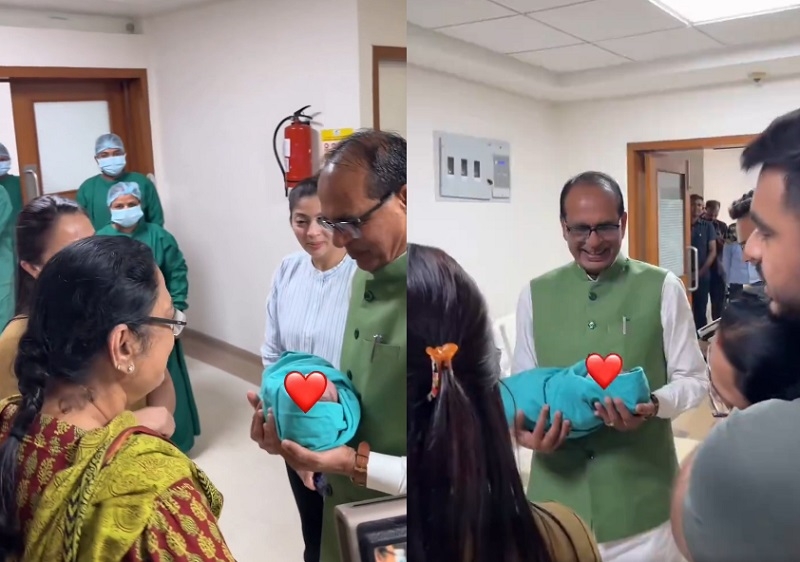 अस्पताल में शिवराज सिंह के हाथ में पोता सौंपते हुए नर्स (वीडियो से ली गई तस्वीर) अस्पताल में शिवराज सिंह के हाथ में पोता सौंपते हुए नर्स (वीडियो से ली गई तस्वीर)