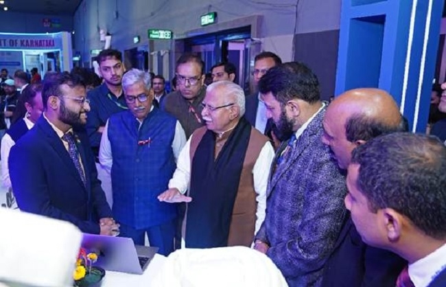 एआई इंपैक्ट समिट 2026 में विद्युत मंत्री मनोहर लाल और अन्‍य