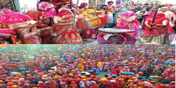 नंदगांव की होली में अबीर-गुलाल के संग झूमते हुरियारे नंदगांव की होली में अबीर-गुलाल के संग झूमते हुरियारे