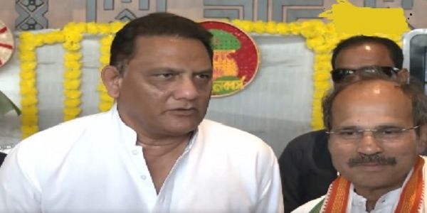 भारतीय क्रिकेट टीम के पूर्व कप्तान मोहम्मद अजहरुद्दीन  कांग्रेस प्रत्याशी अधीर रंजन चौधरी