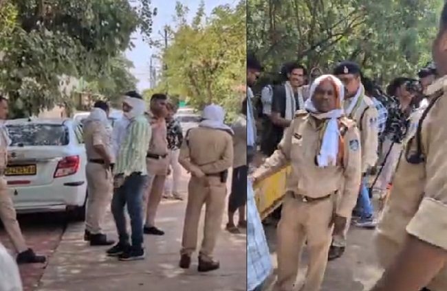 गिरिबाला सिंह के घर के बाहर तैनात पुलिस गिरिबाला सिंह के घर के बाहर तैनात पुलिस