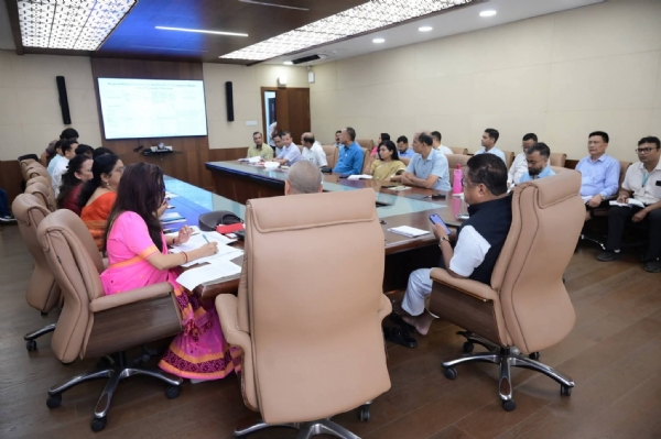 Education Minister Ranoj Pegu during a meeting held at his Janata Bhawan office conference hall.
