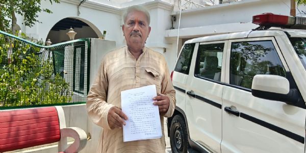 मंदिर की पैतृक भूमि पर अवैध कब्जे का आरोप, जिलाधिकारी से कार्रवाई की मांग