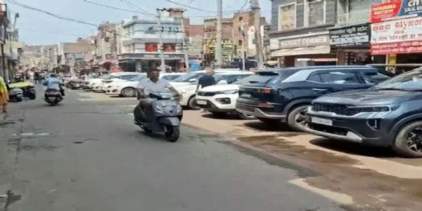 हिसार में राजगुरु मार्केट की नई पार्किंग व्यवस्था पर बवाल, व्यापारियों ने उठाए सवाल